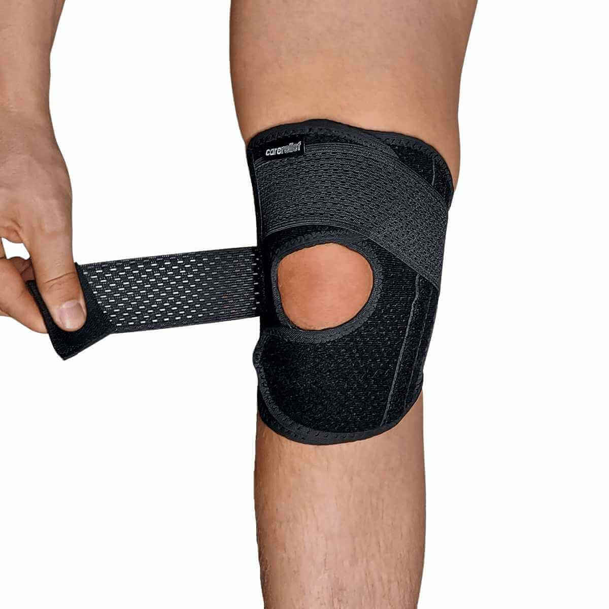 Knæstøtte med stålfjedre/skinner og åben patella, justerbart, 4 str. sort. KN25 er et ultra let knæbind med komfort og støtte til et overbelastet og skadet knæ, springerknæ og menisk.